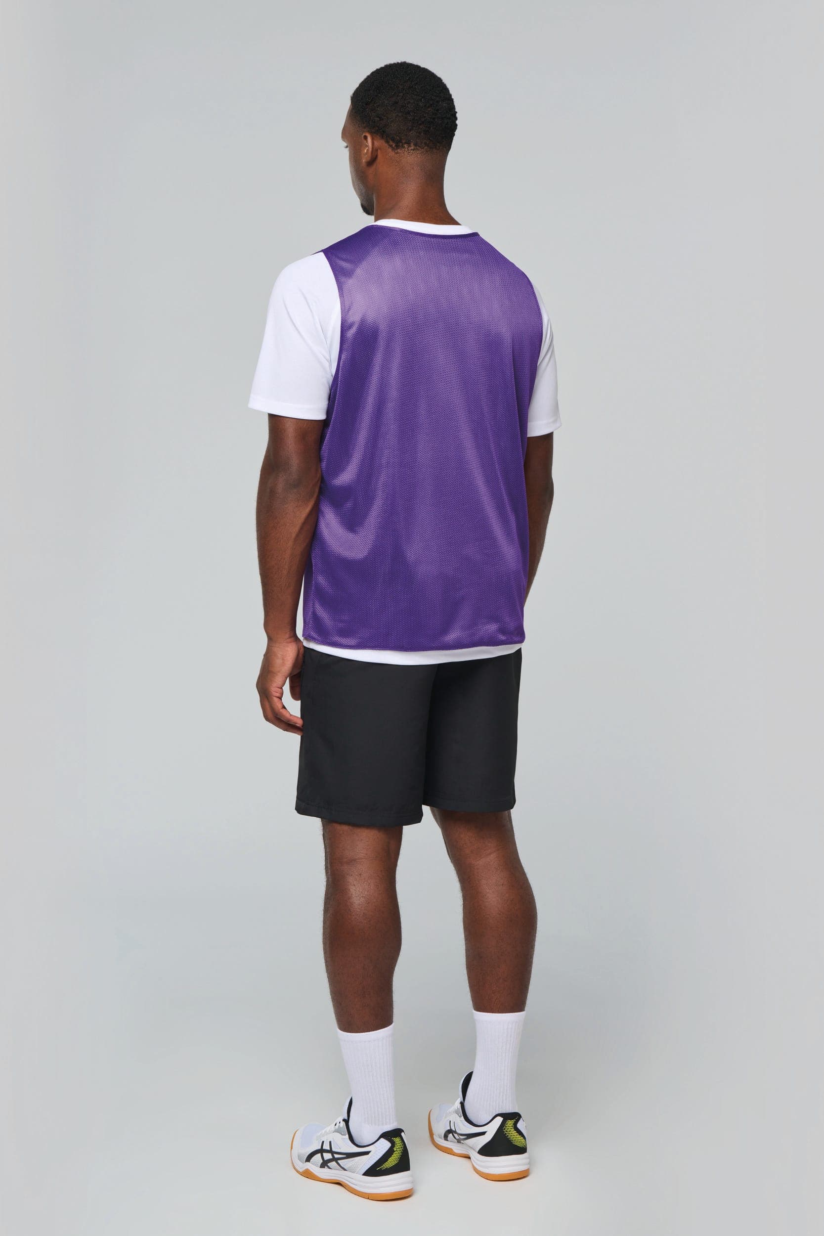 Chasuble réversible multisports unisexe en situation