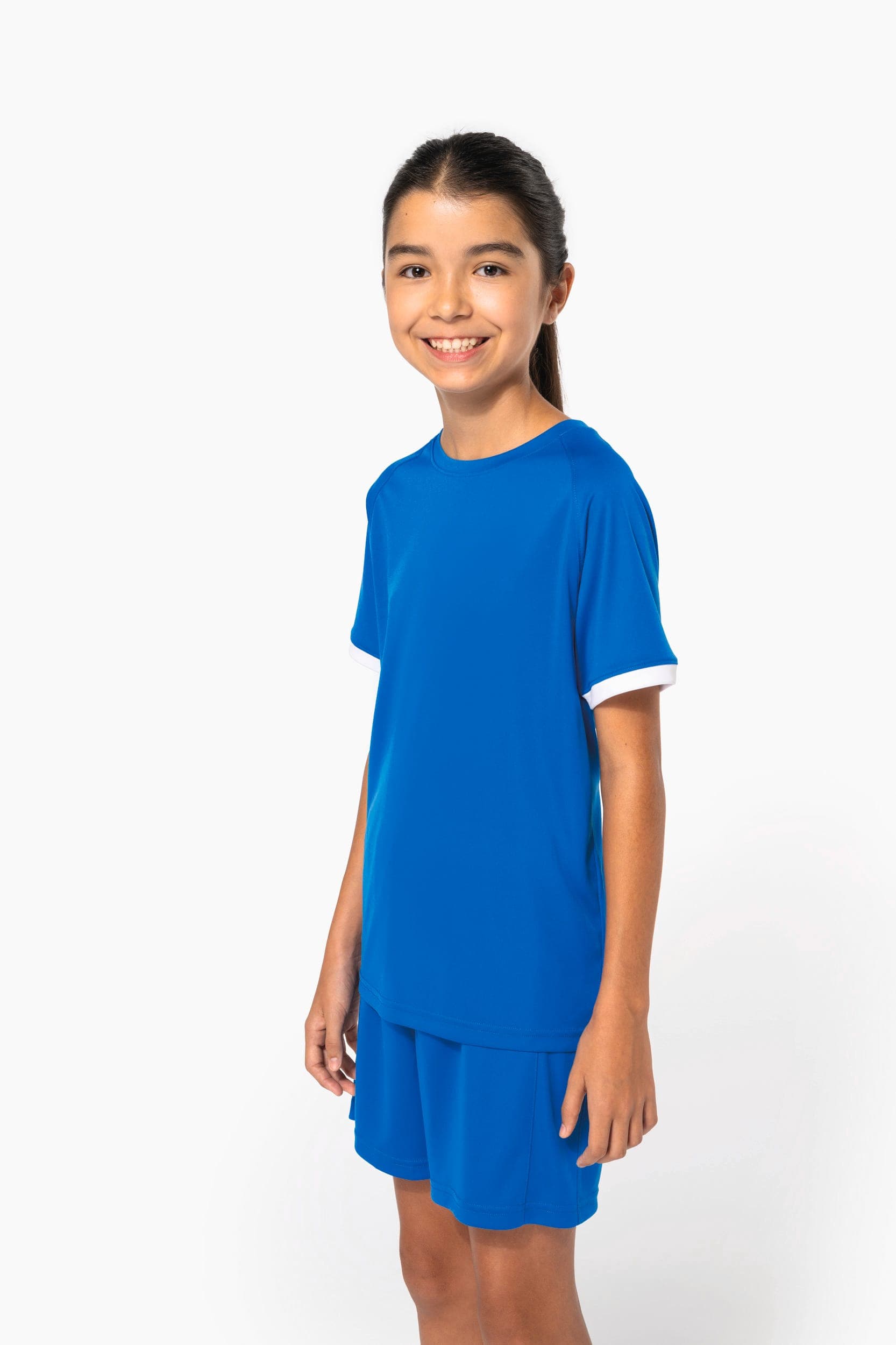 Short multisport en polyester enfant en situation