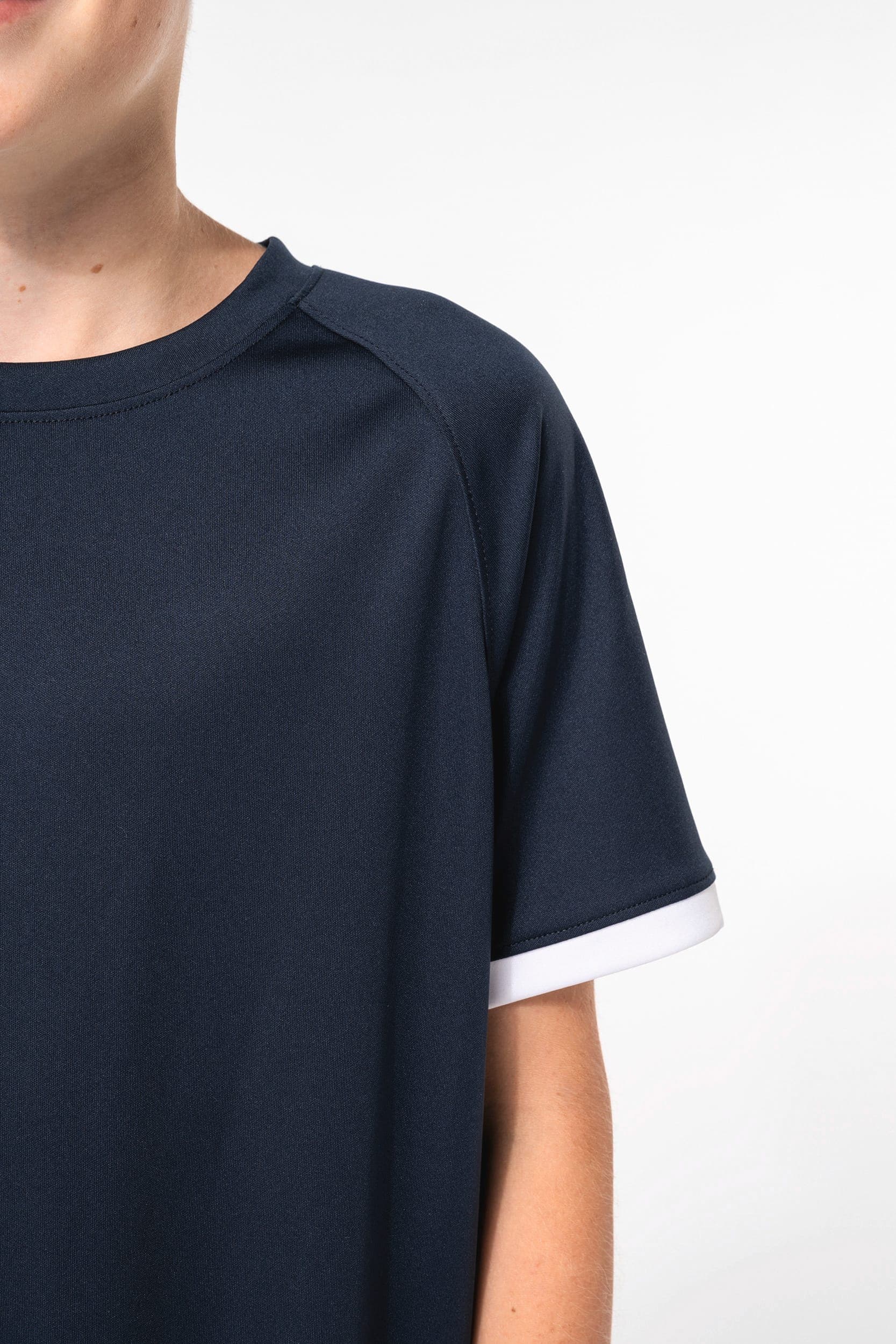 Maillot multisport en polyester enfant en situation