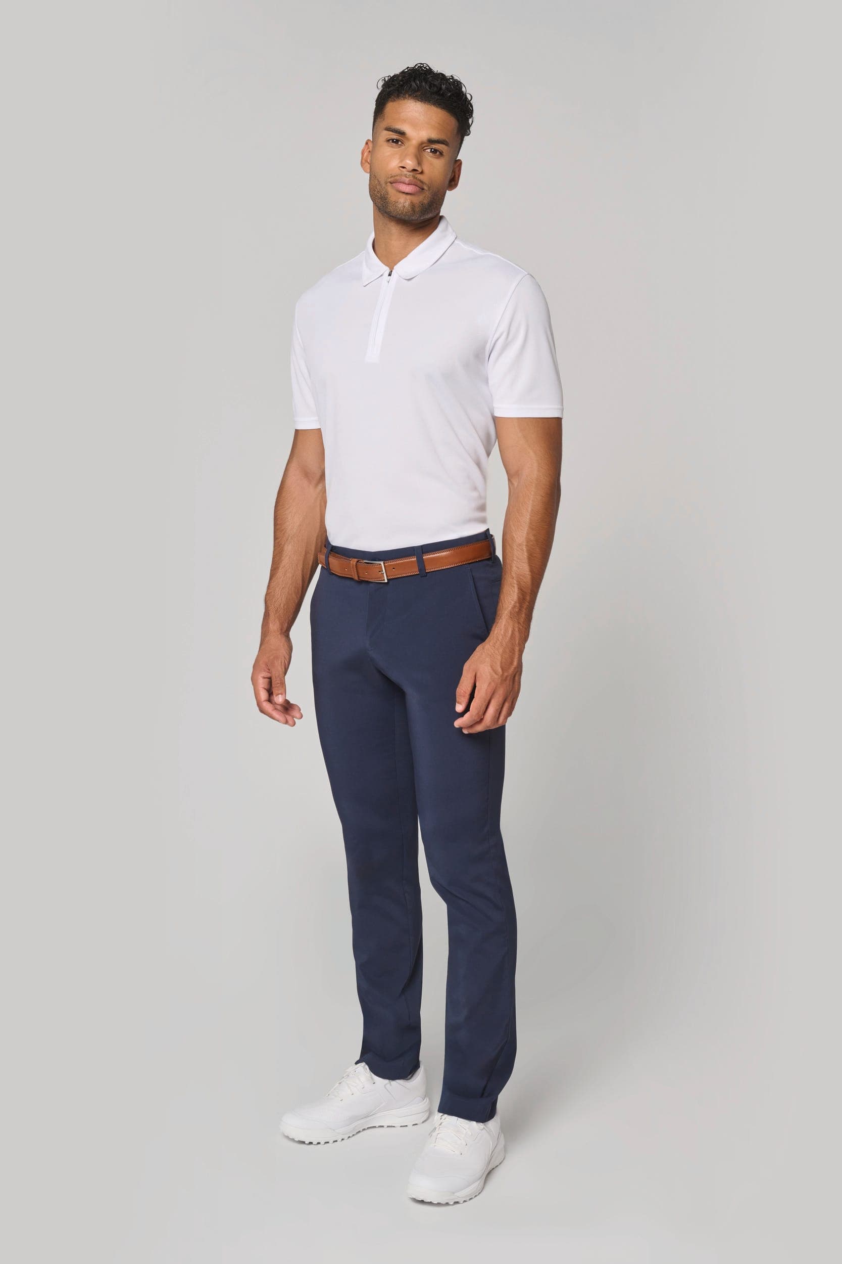 Polo de sport col 1/4 zip homme en situation