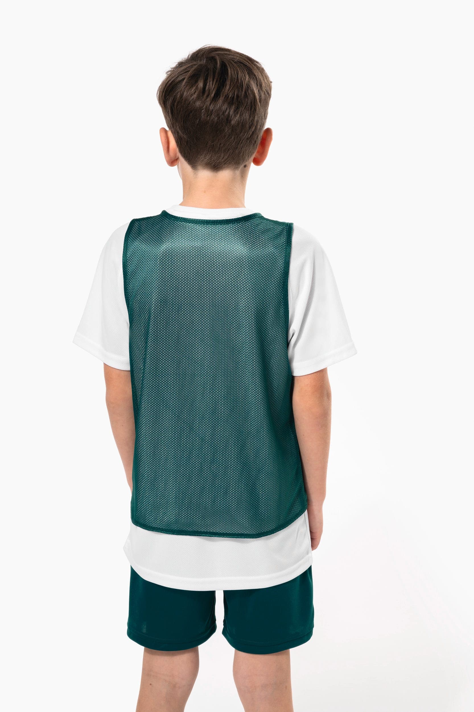 Chasuble réversible multisports enfant en situation