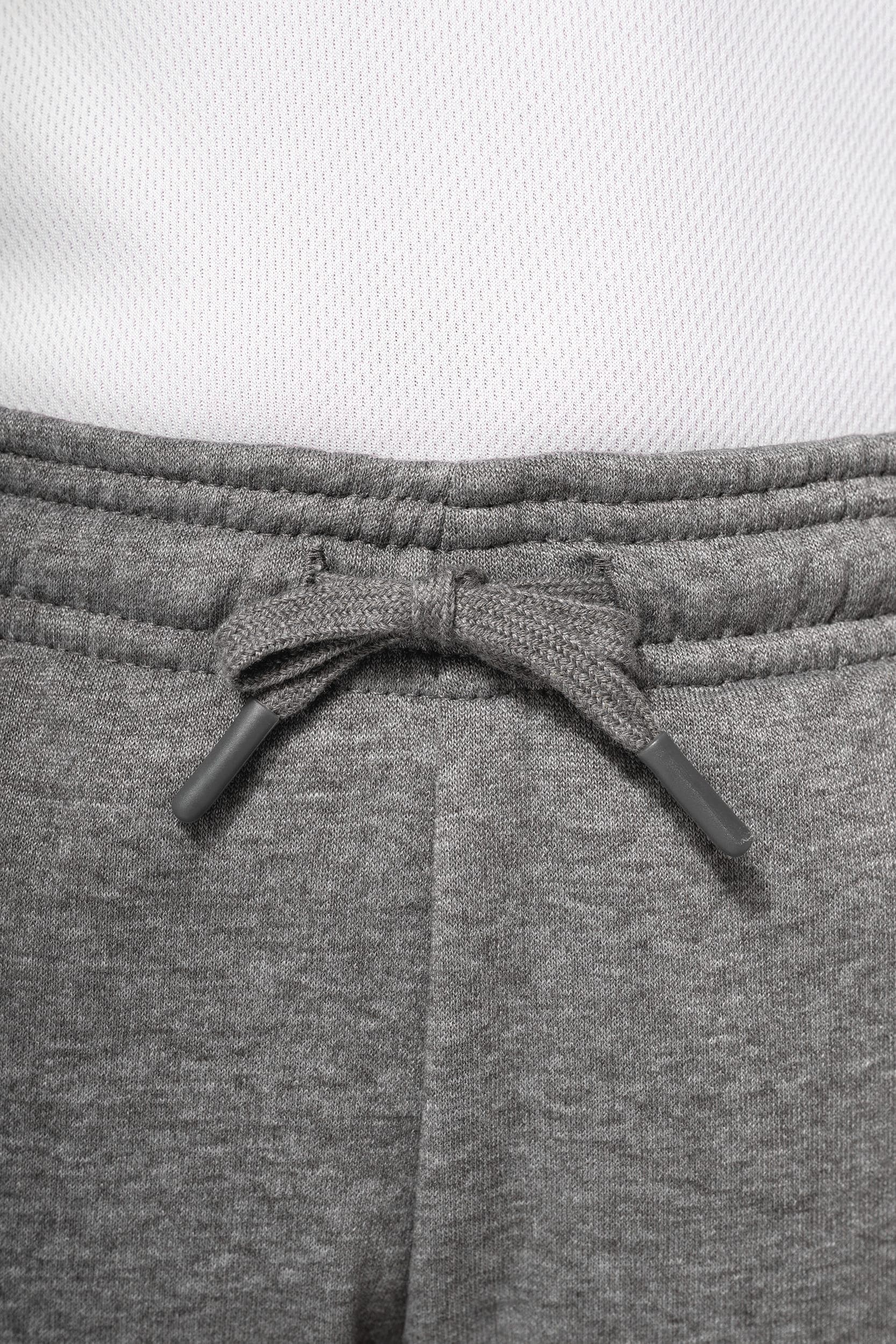 Pantalon de jogging à poches multisports enfant en situation