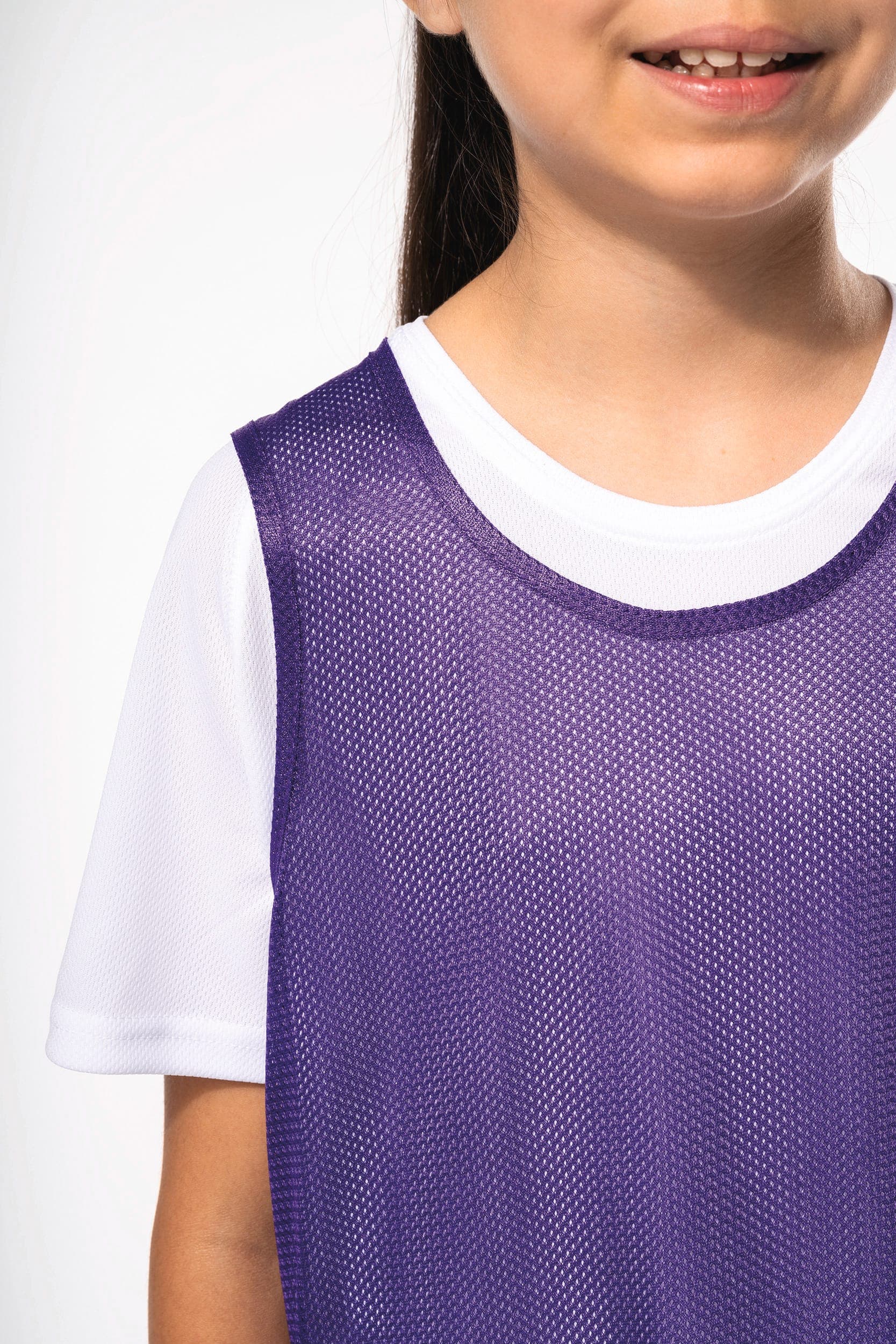 Chasuble en filet léger multisports enfant en situation