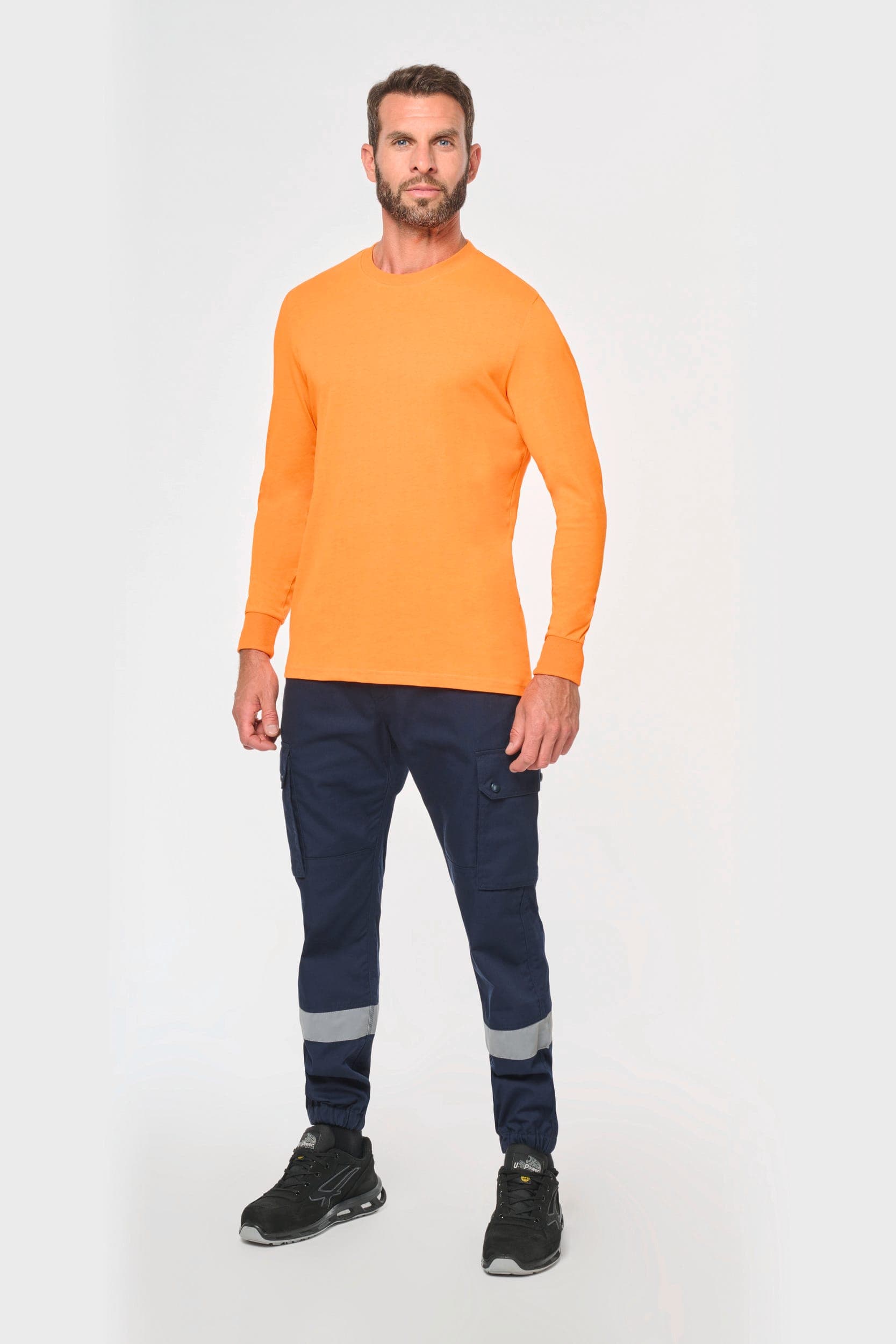 Pantalon cargo unisexe avec bas élastiqué et bande réfléchissante en situation
