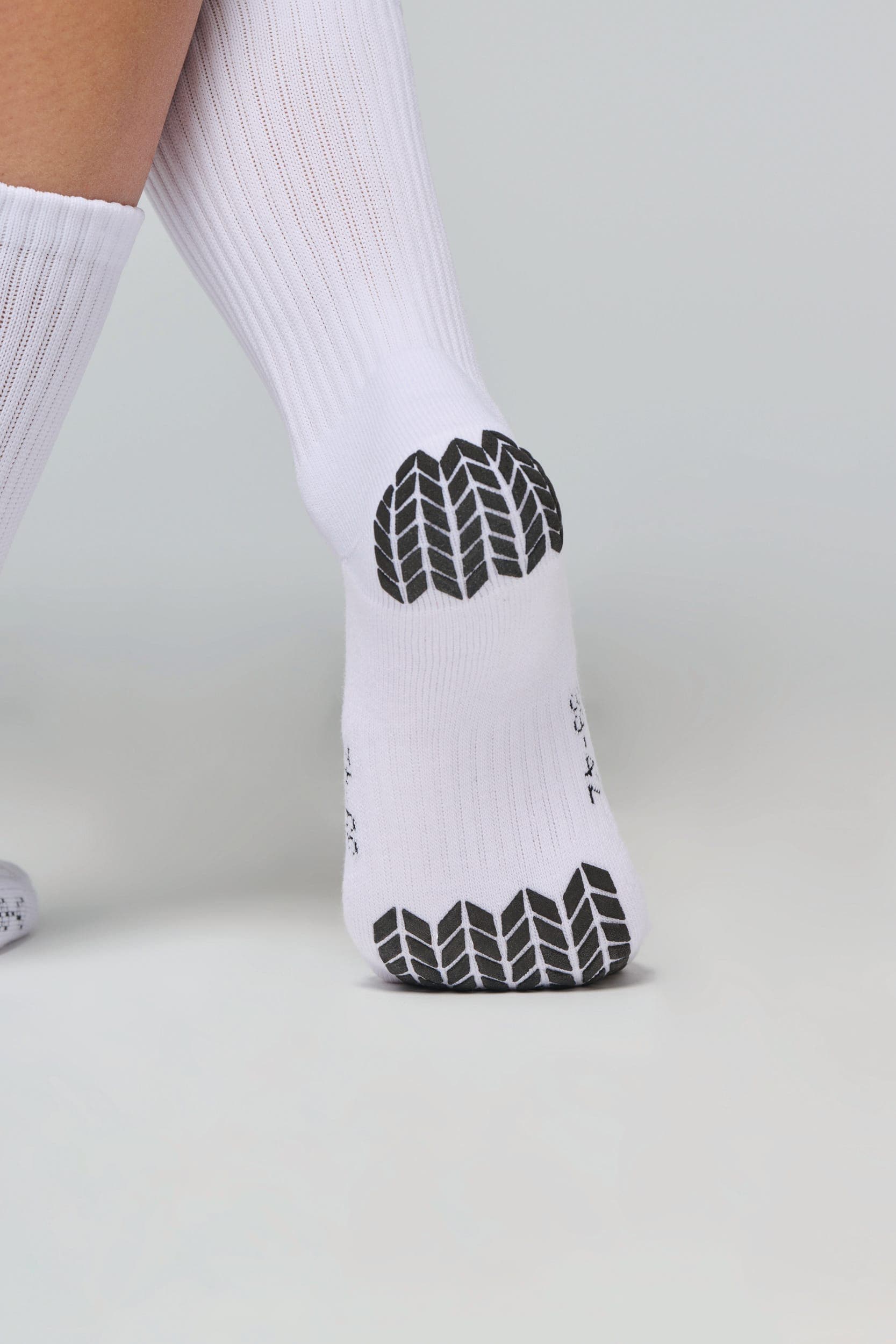 Chaussettes de sport anti-glisse unisexe en situation