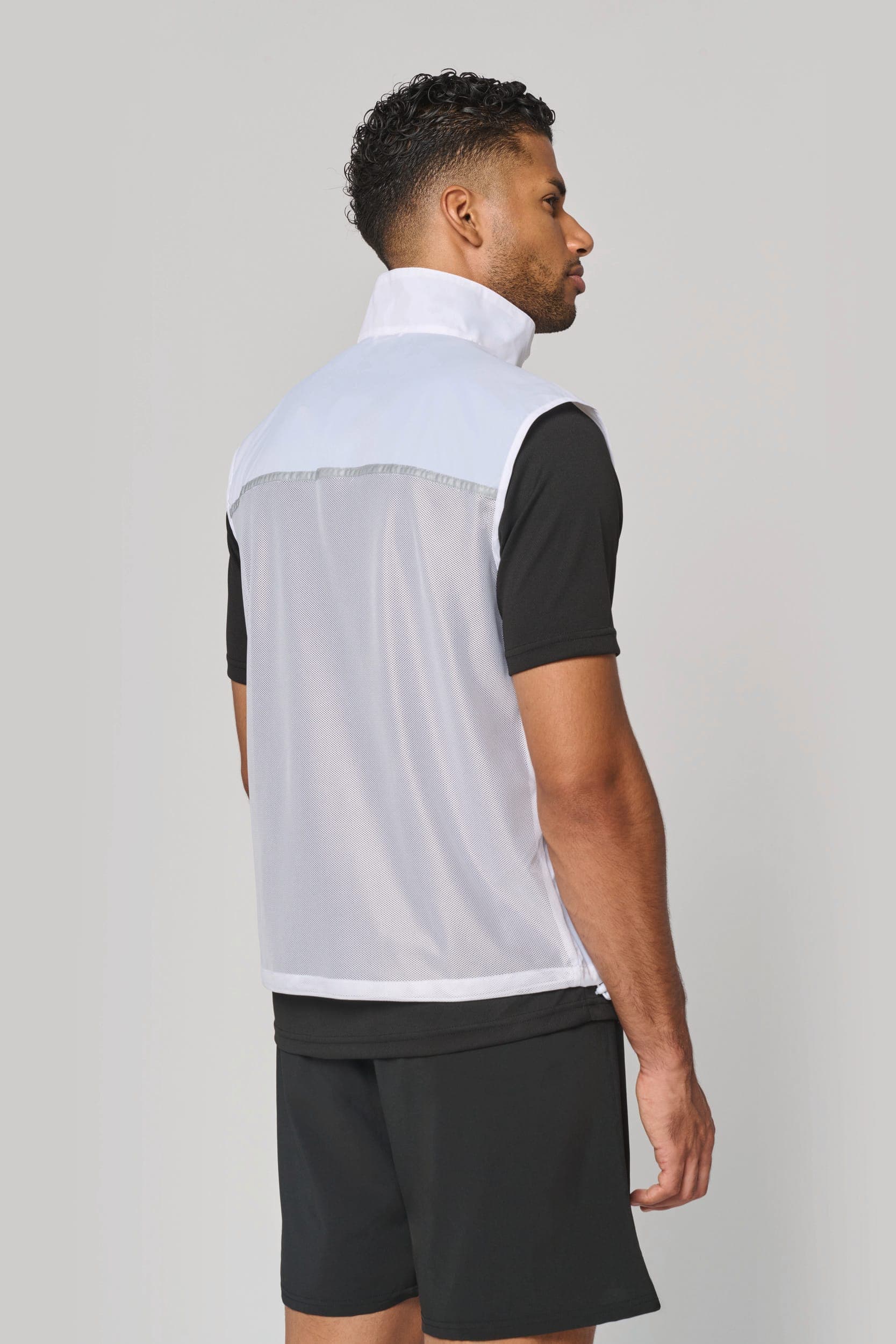 Runner - gilet d'entraînement dos filet unisexe en situation