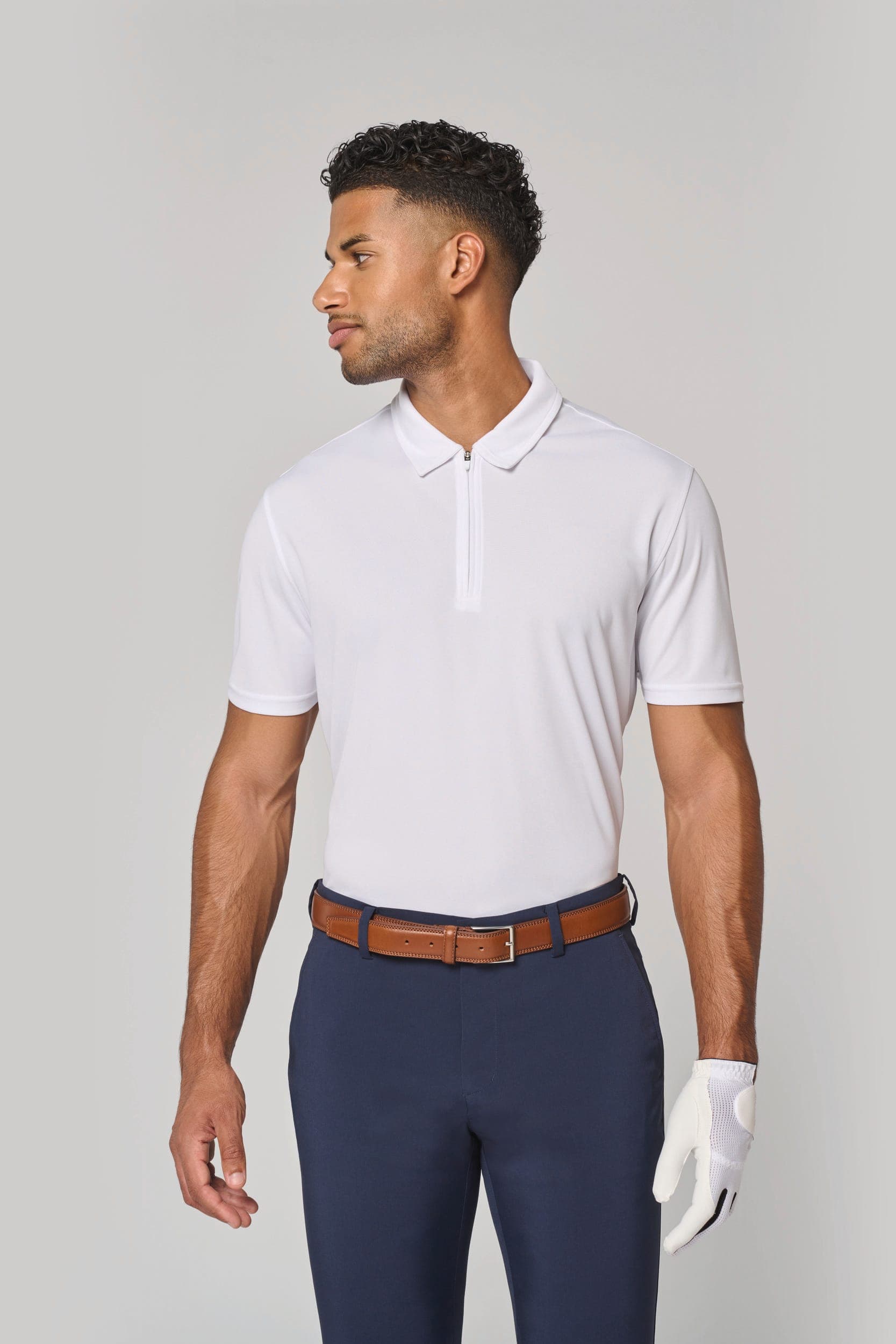 Polo de sport col 1/4 zip homme en situation