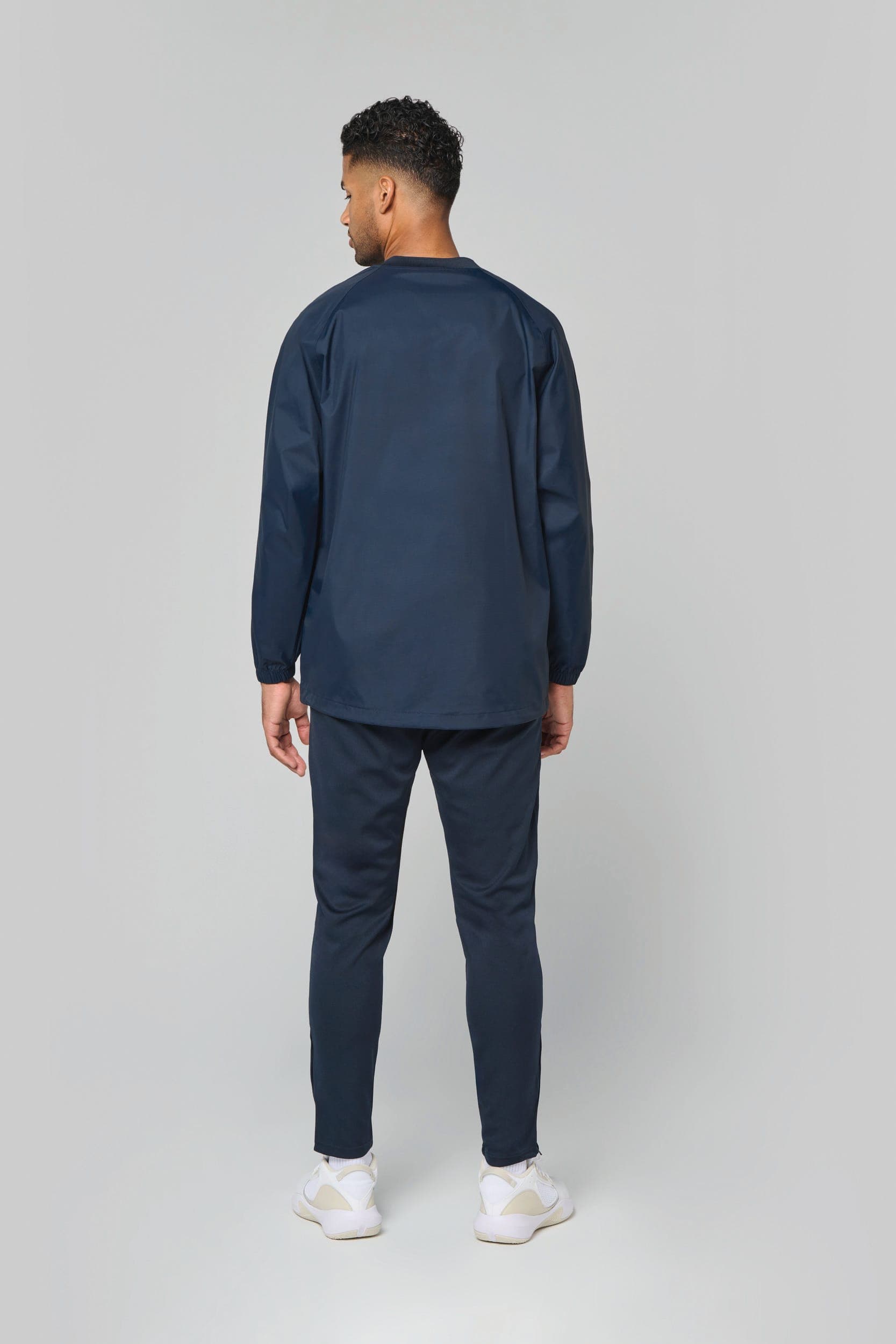 Sweat de pluie multisport unisexe en situation