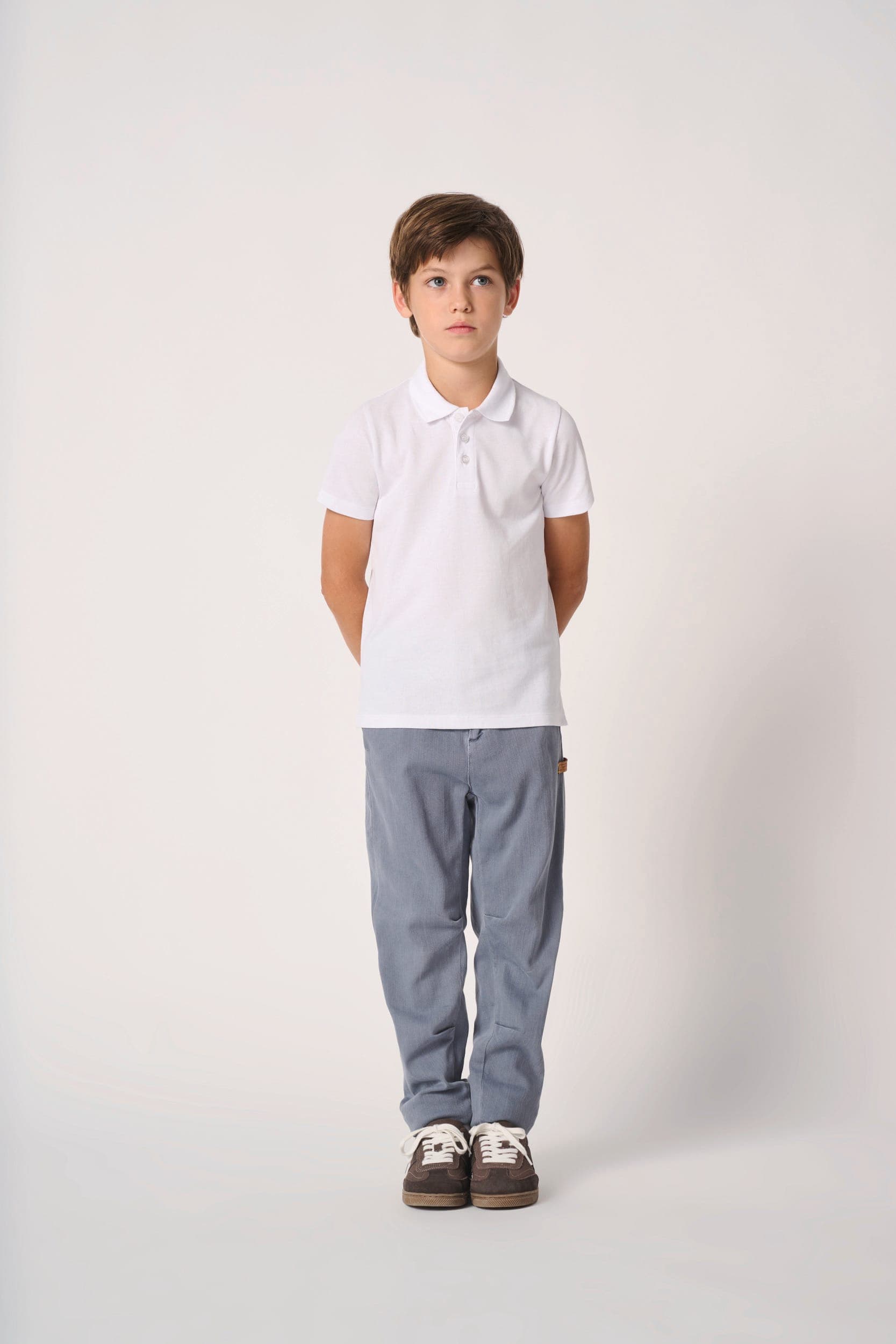 Polo piqué enfant en situation
