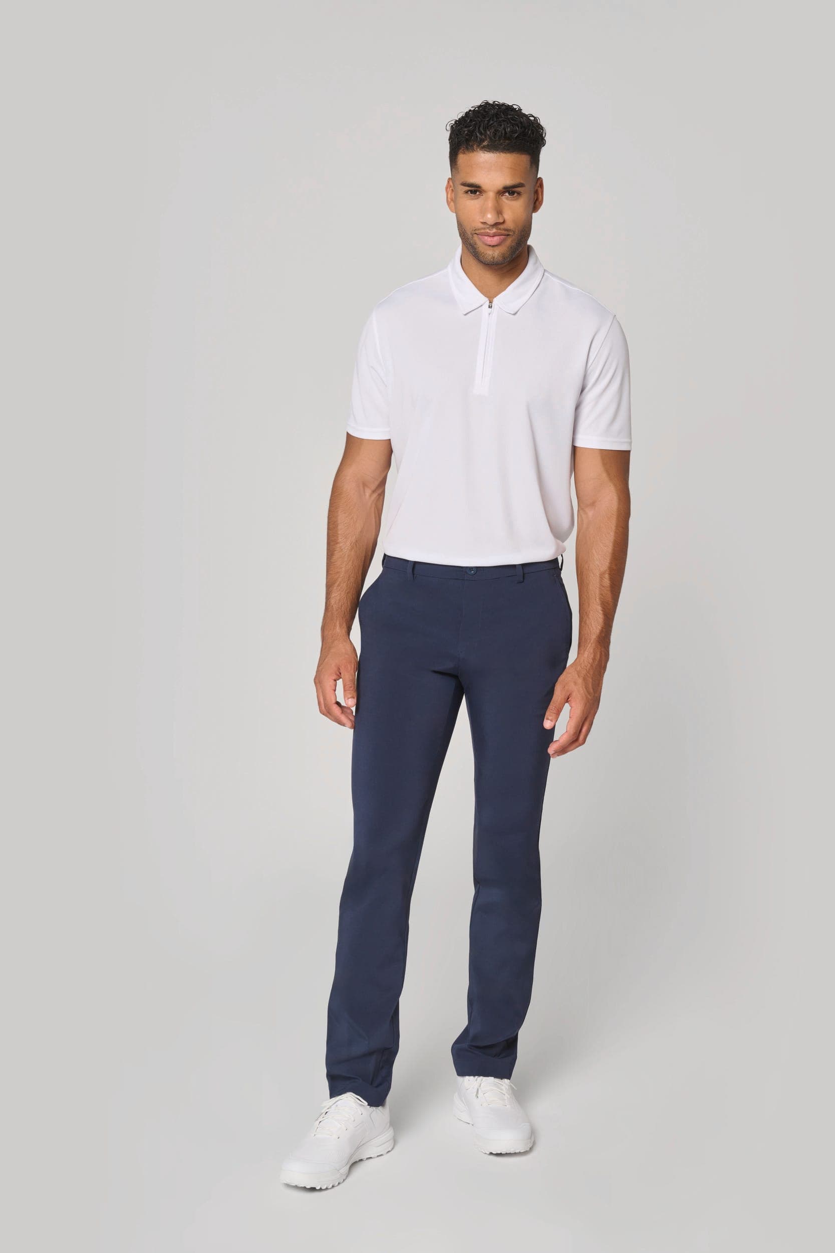 Polo de sport col 1/4 zip homme en situation