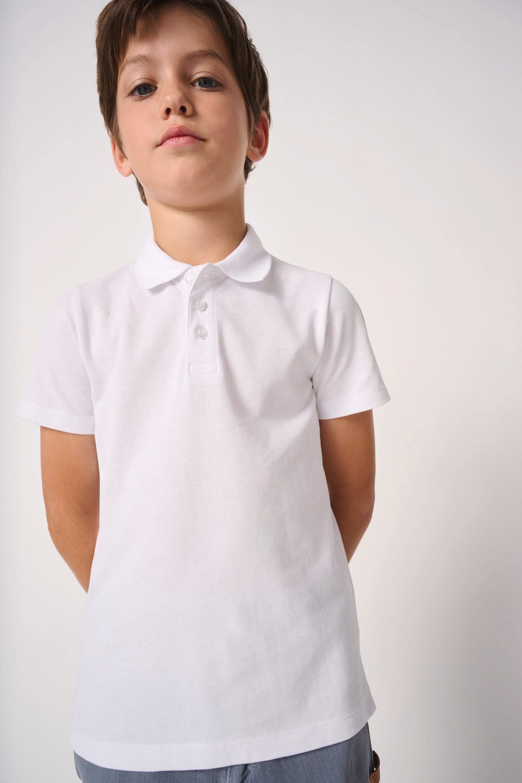 Polo piqué enfant en situation