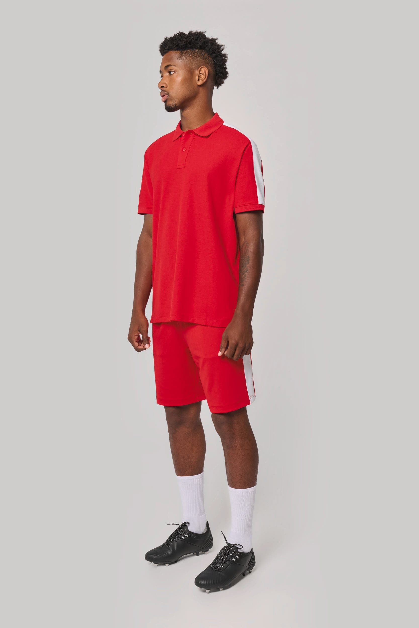 Polo teamwear unisexe en situation