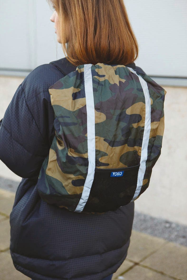 Housse de protection imperméable pour sac à dos en situation