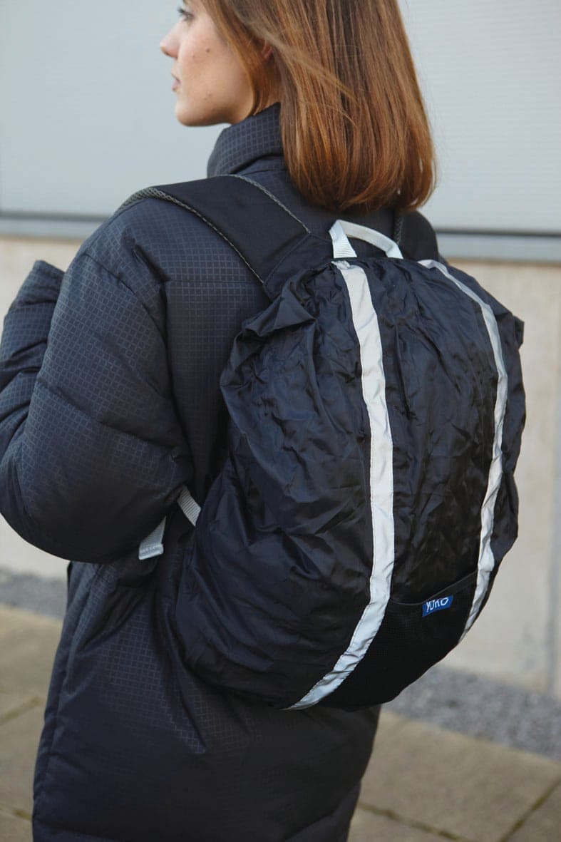 Housse de protection imperméable pour sac à dos en situation