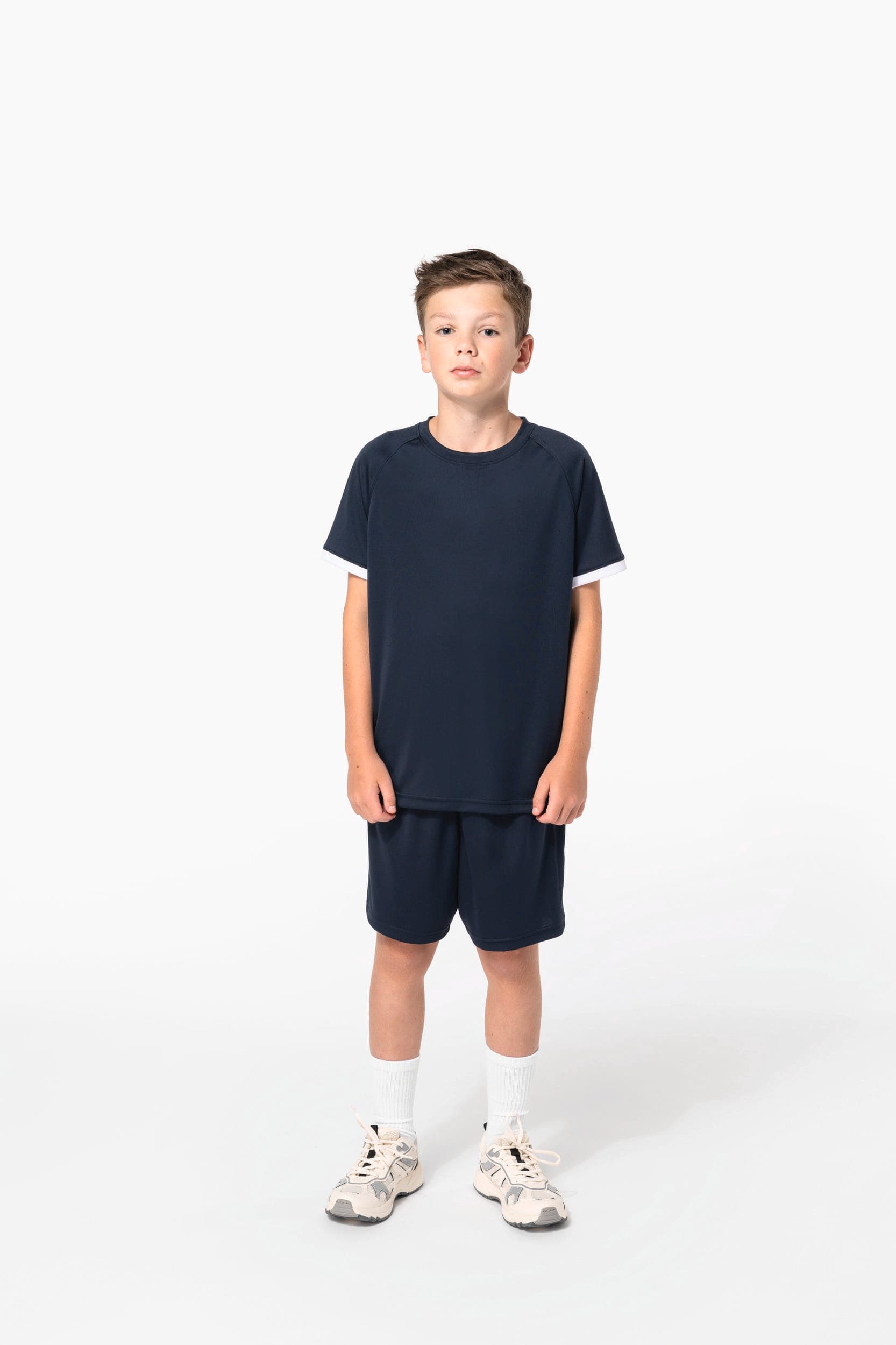 Short multisport en polyester enfant en situation