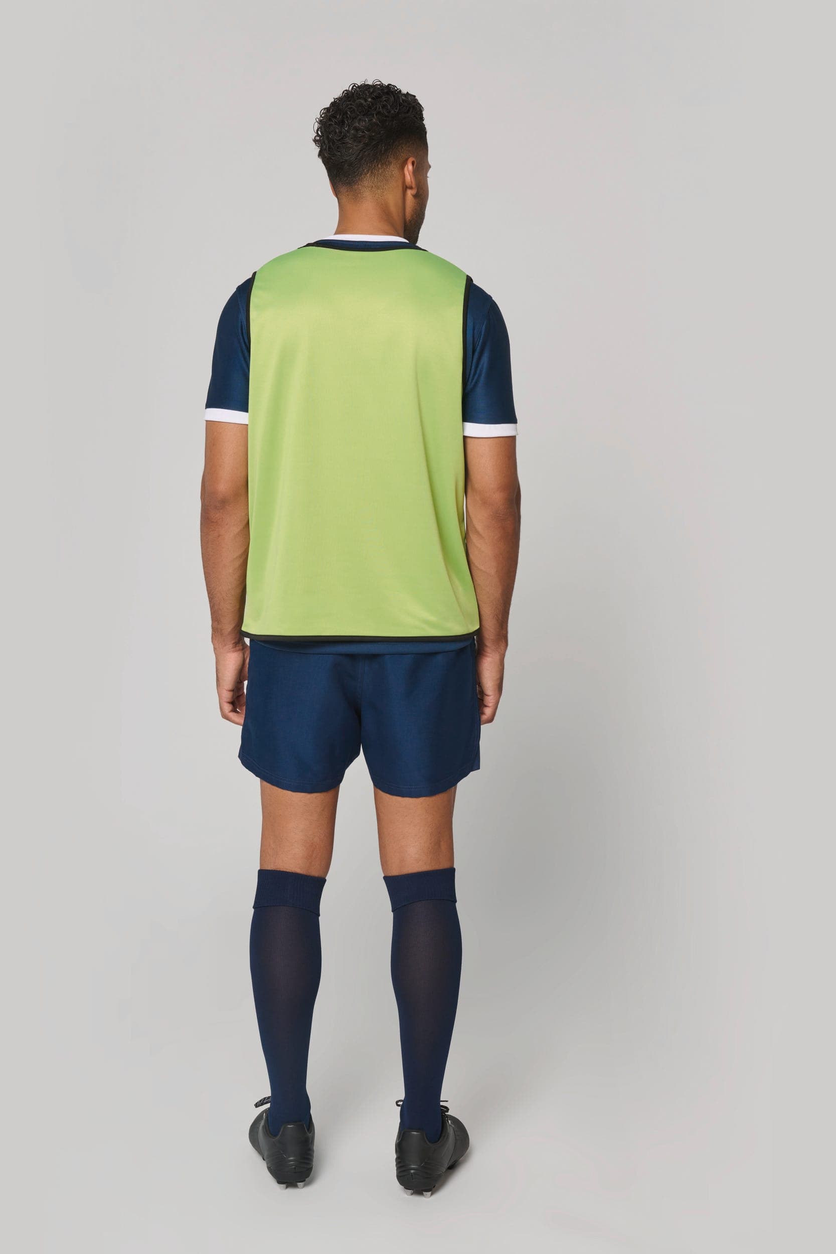 Chasuble de rugby réversible unisexe en situation