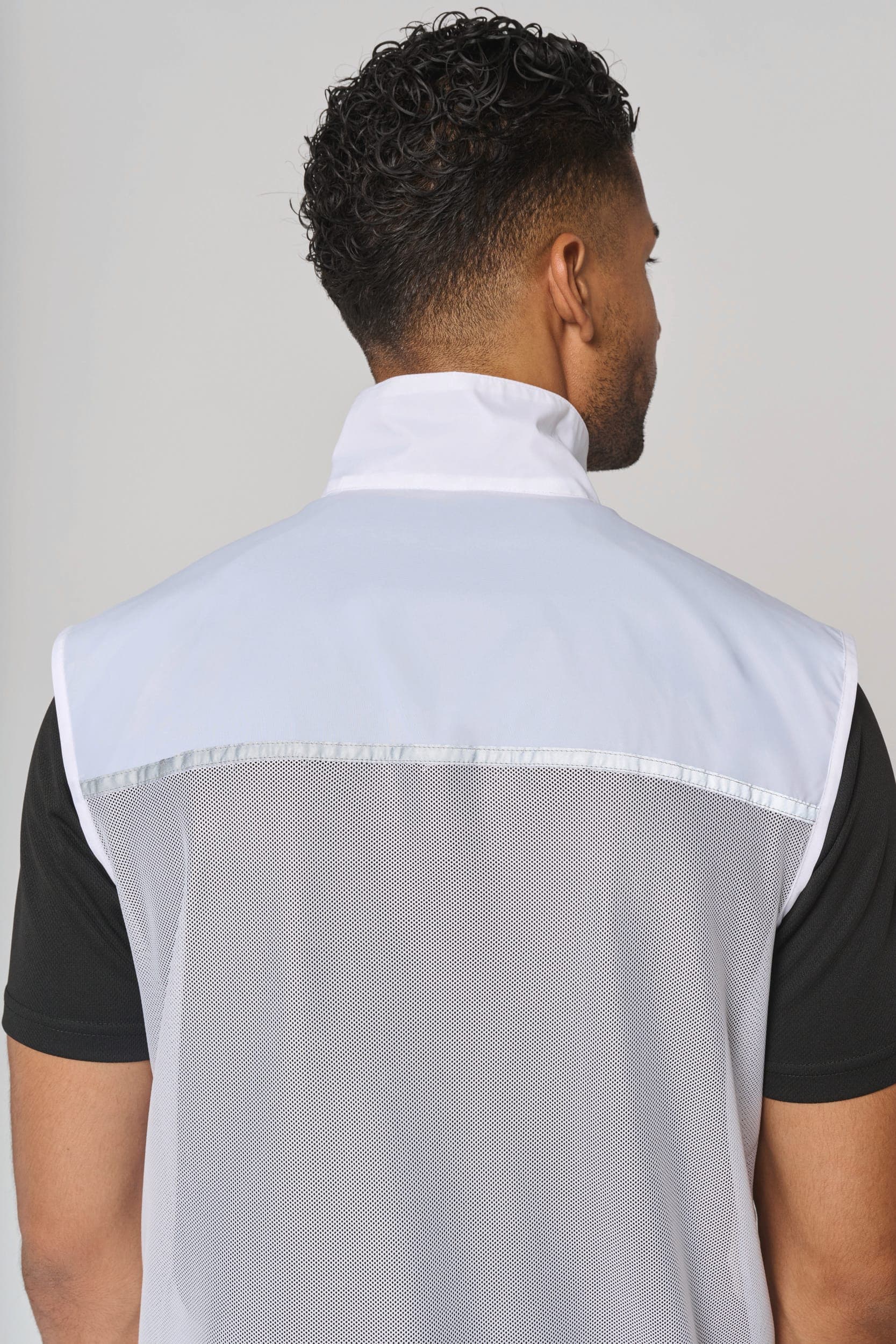 Runner - gilet d'entraînement dos filet unisexe en situation