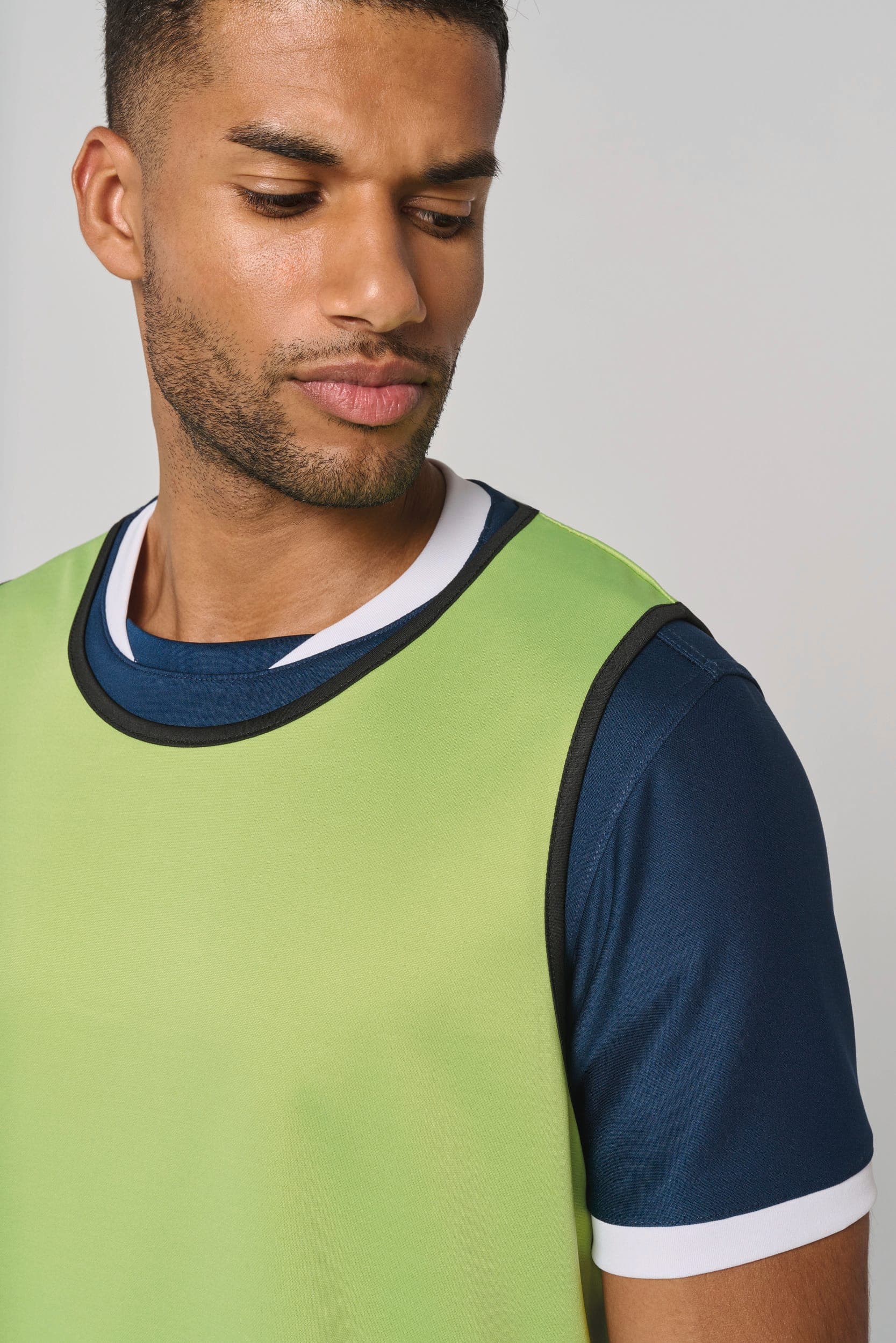 Chasuble de rugby réversible unisexe en situation