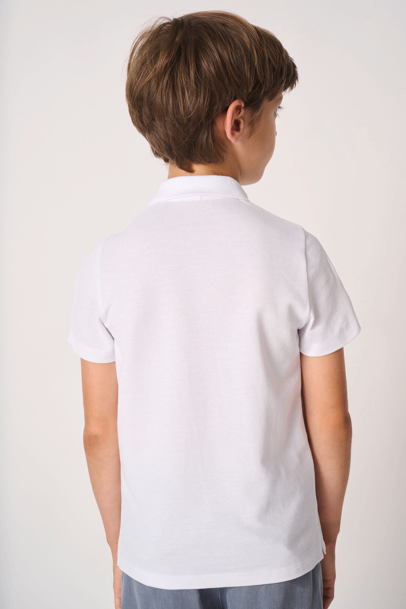 Polo piqué enfant en situation