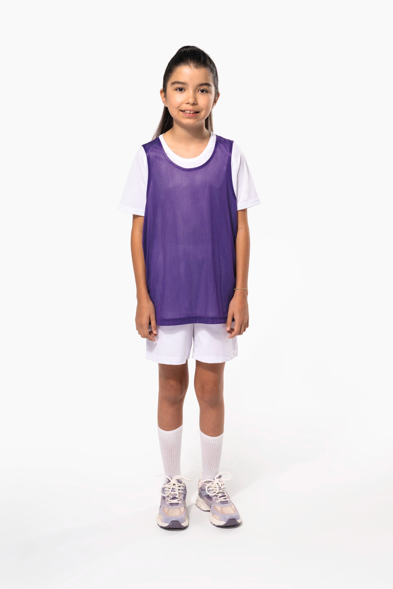 Chasuble en filet léger multisports enfant en situation