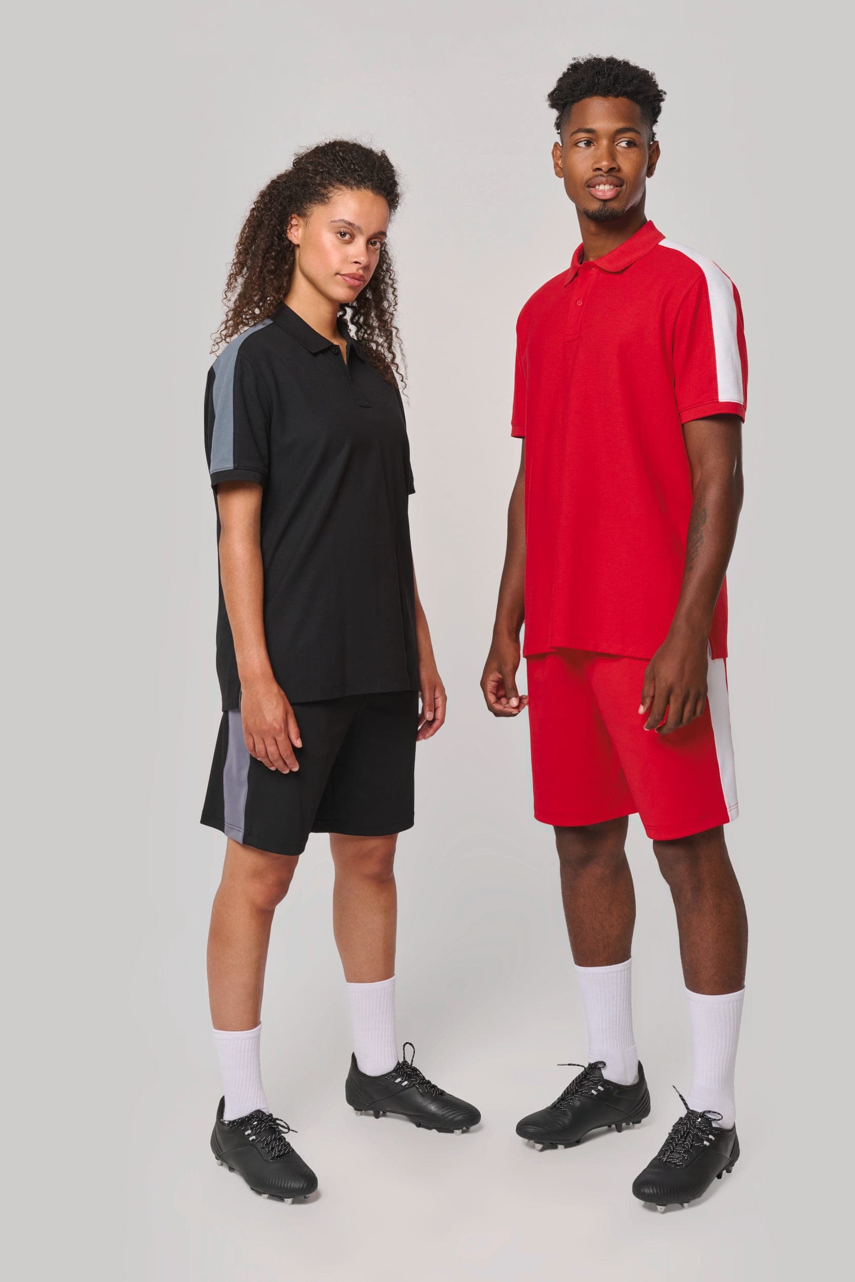 Polo teamwear unisexe en situation