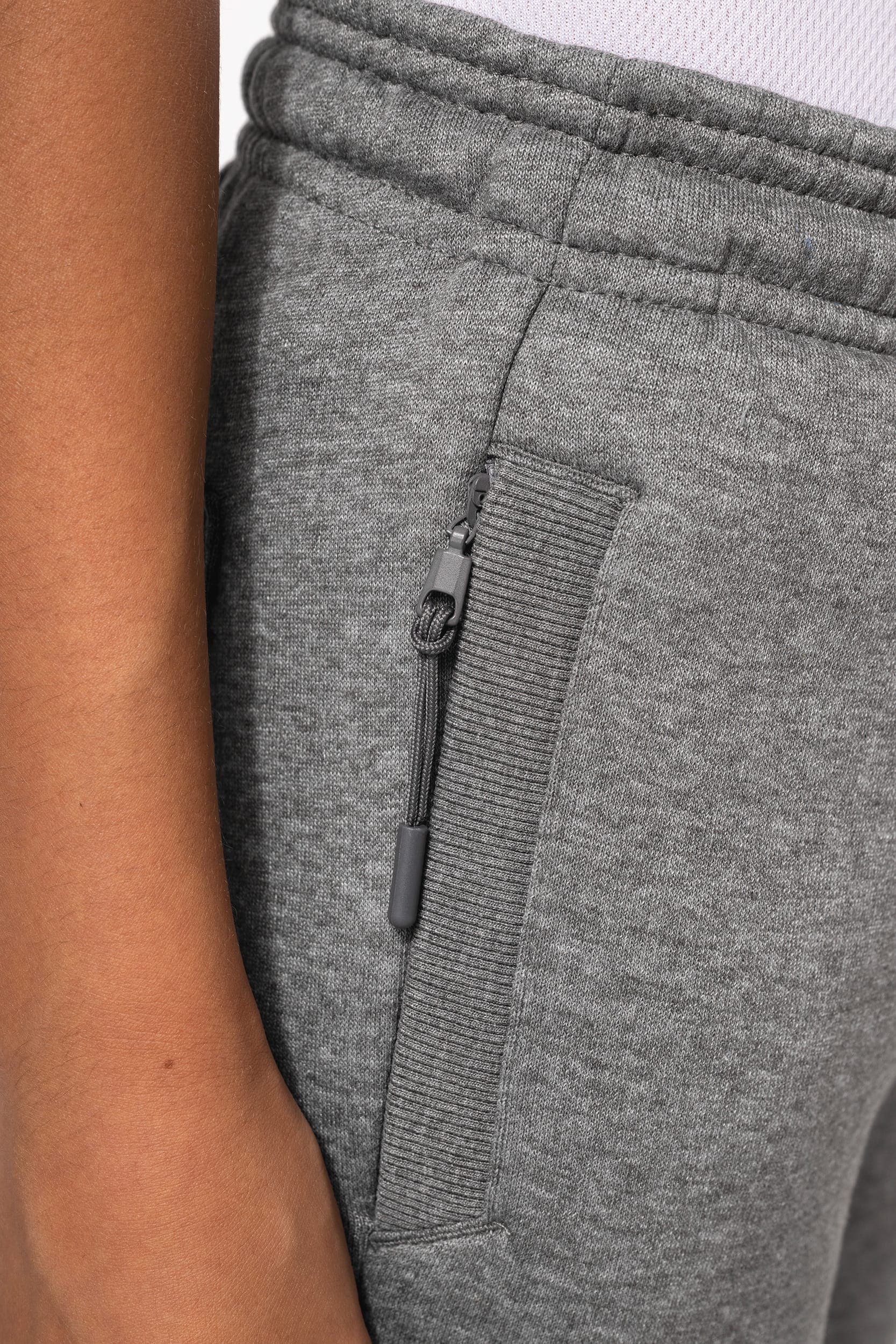 Pantalon de jogging à poches multisports enfant en situation