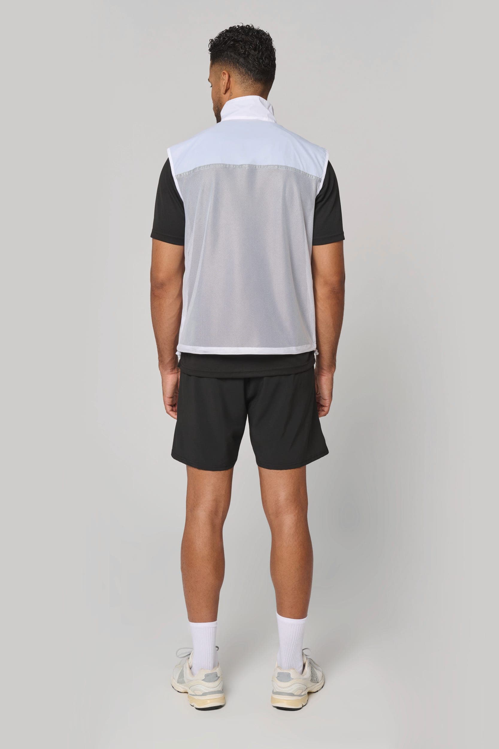 Runner - gilet d'entraînement dos filet unisexe en situation