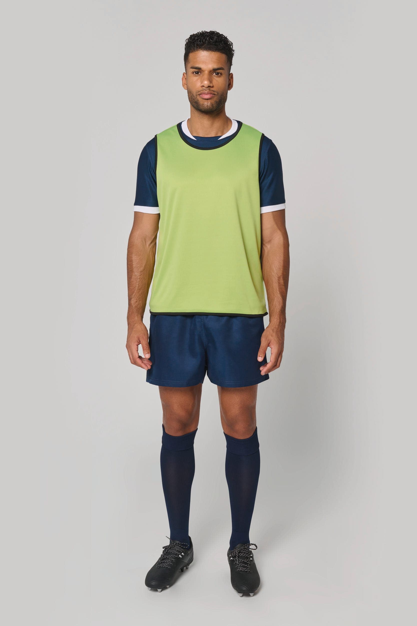 Chasuble de rugby réversible unisexe en situation
