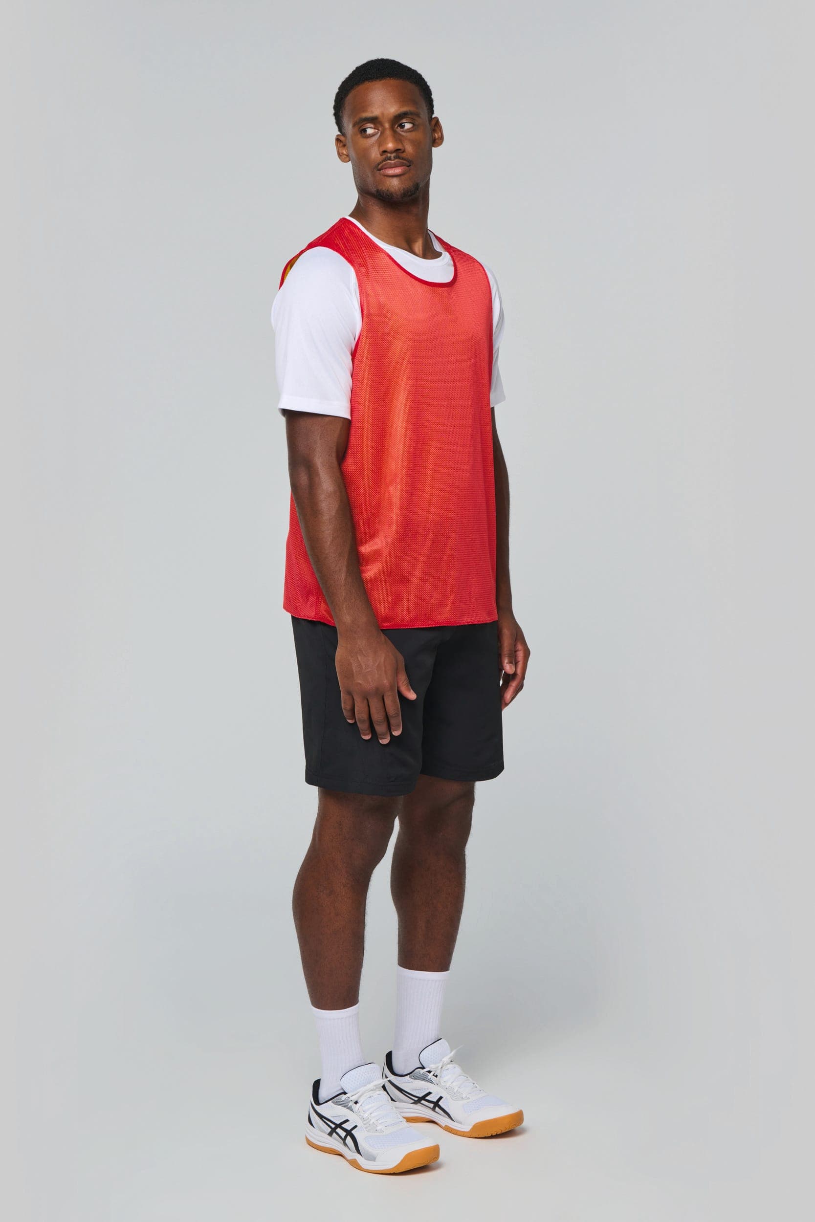 Chasuble réversible multisports unisexe en situation
