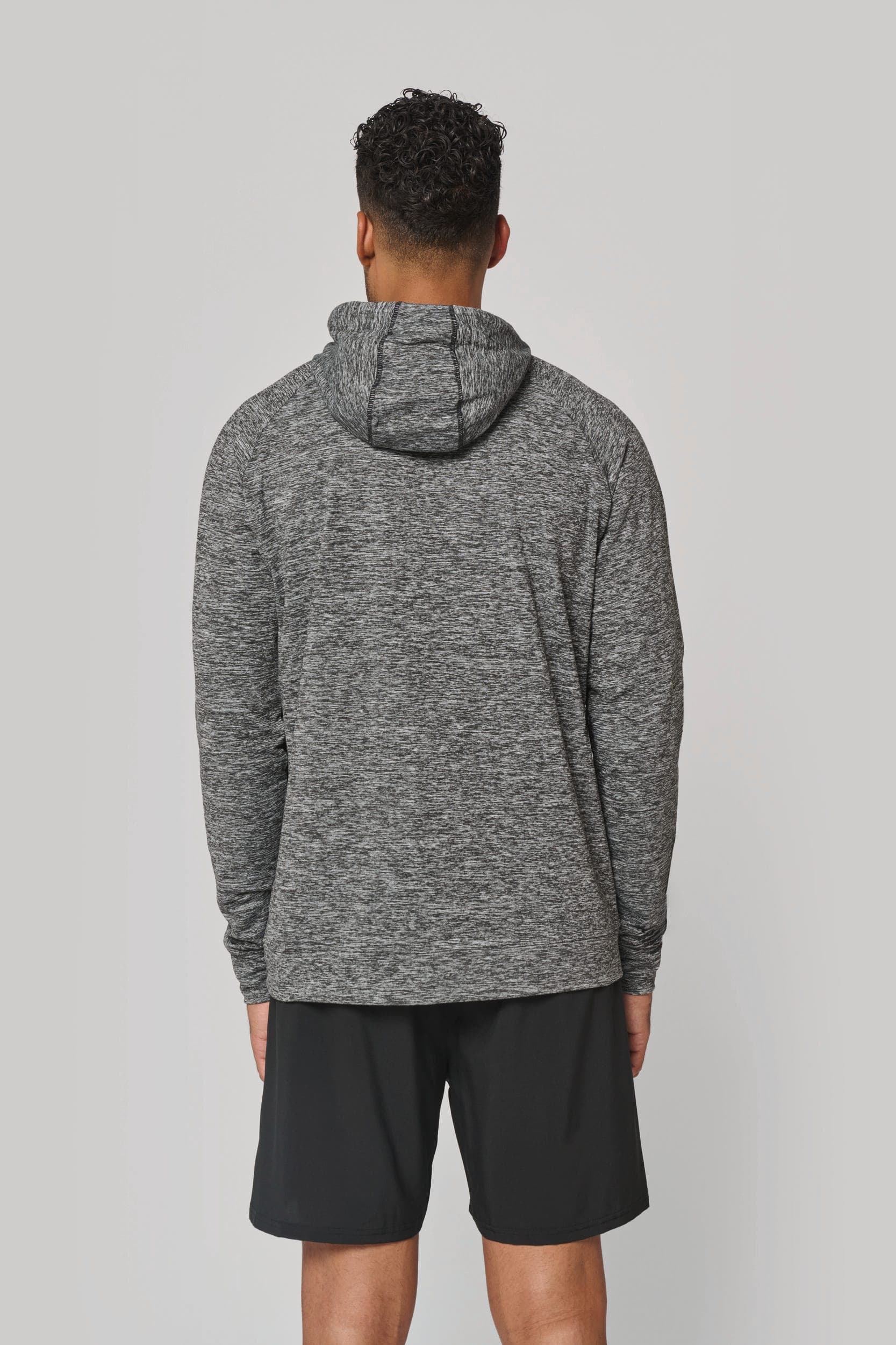 Sweat-shirt à capuche 1/4 zip sport unisexe en situation