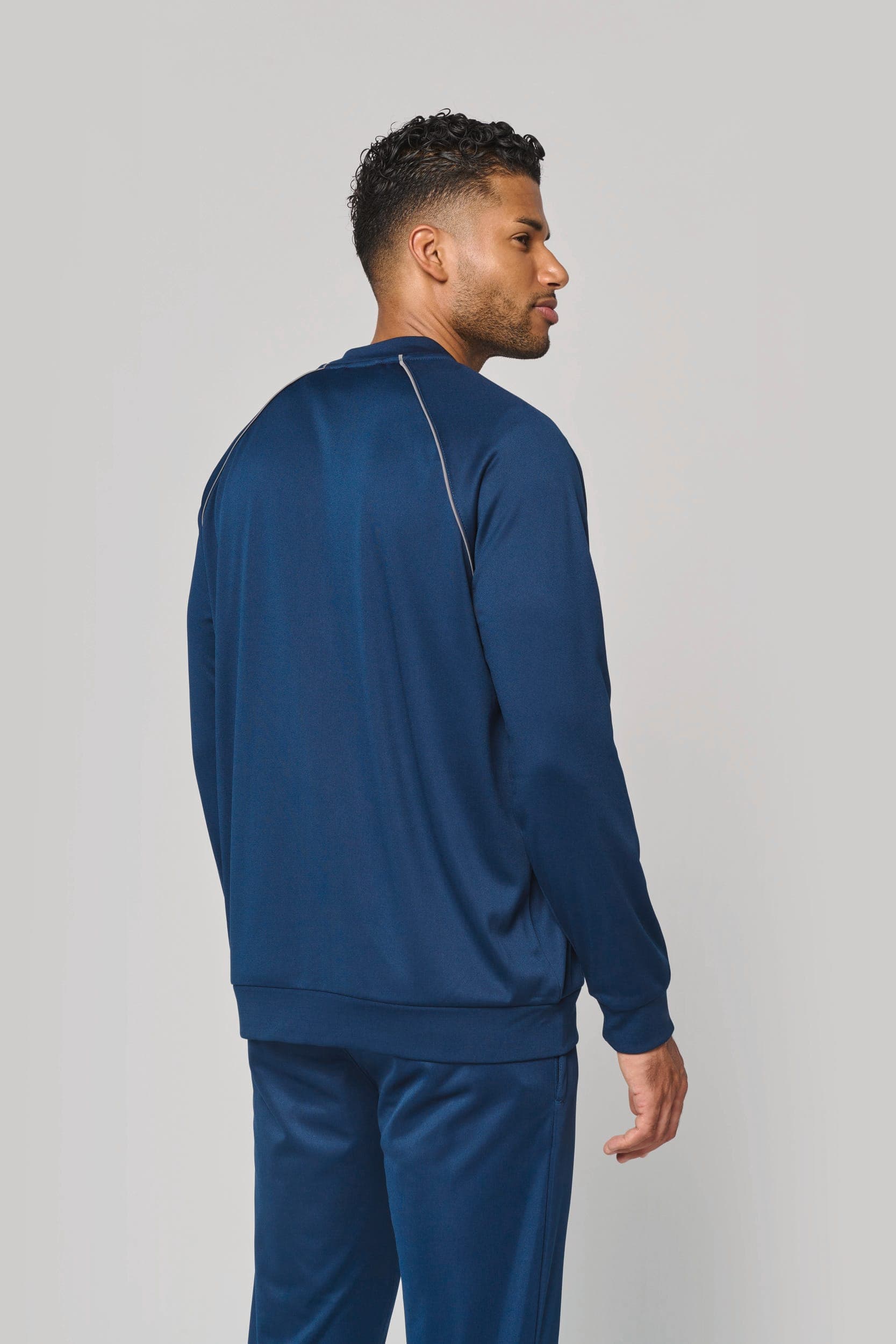 Veste de survêtement zippée avec liseré unisexe en situation